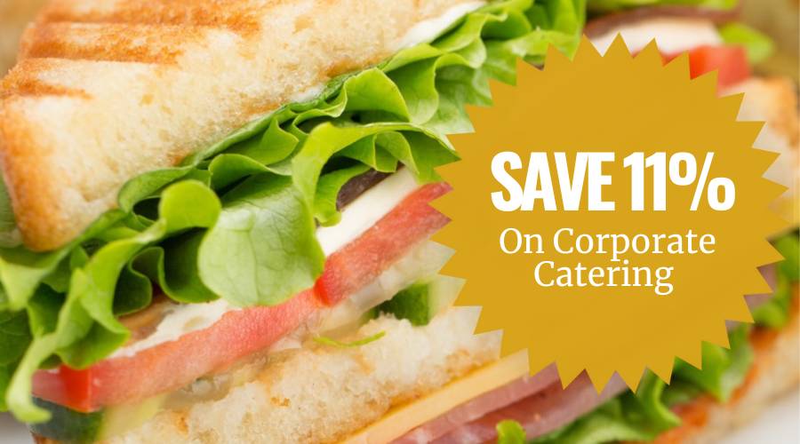 Delicious, freshly made deli sandwich on a bun along with an 11% off corporate catering promo star