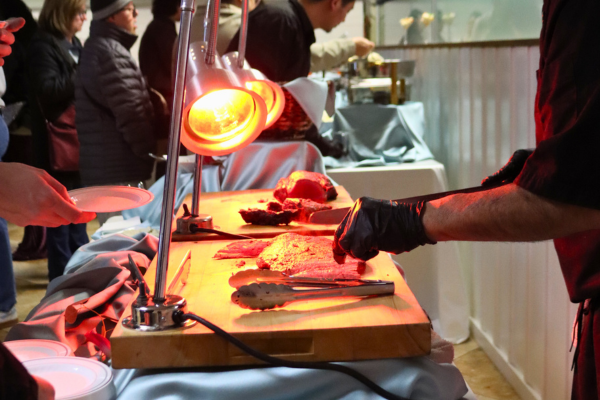 Serving up perfectly cooked beef at a carving station