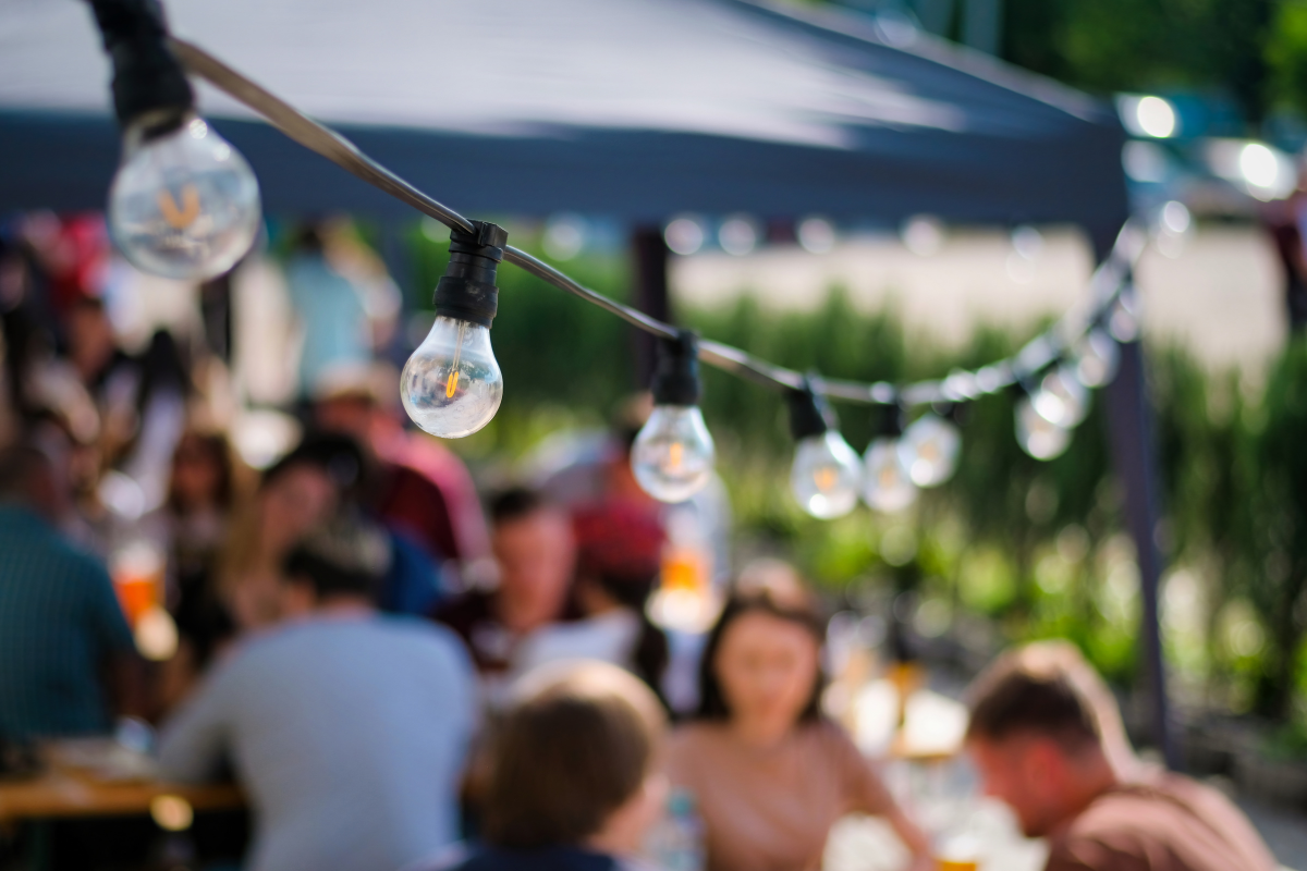 People outside enjoying a catered event