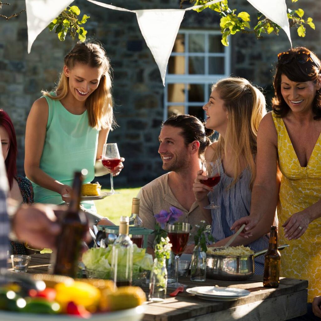 Group of people enjoying a ouside party on labor day