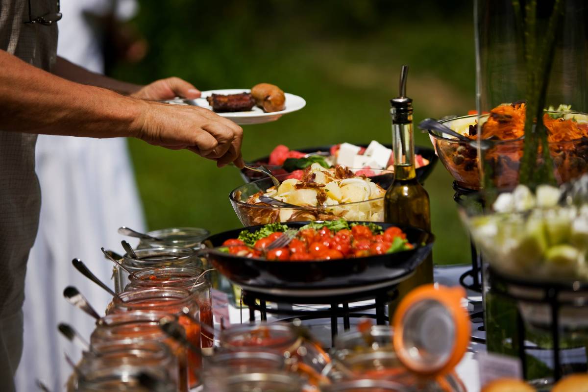 A beautiful catered buffet with guests serving themselves