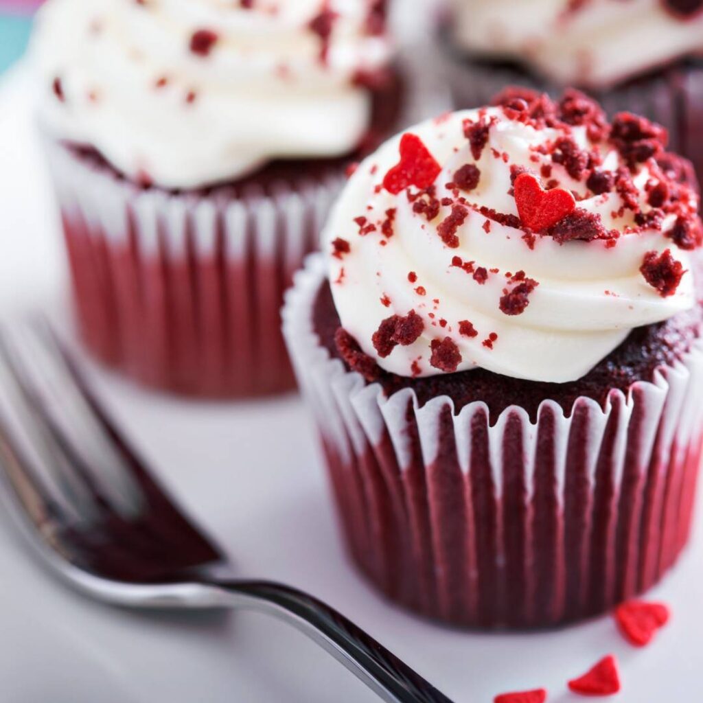 Red Velvet Cupcakes with red heart sprinkles for valentine's day