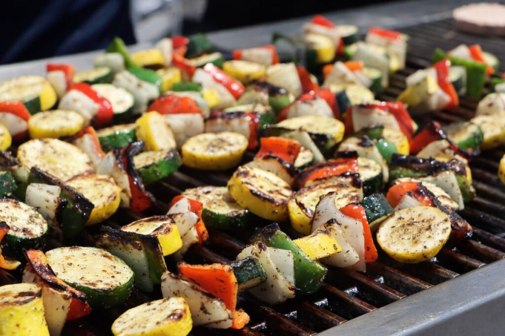 Colorful fresh grilled veggie kabobs on the grill