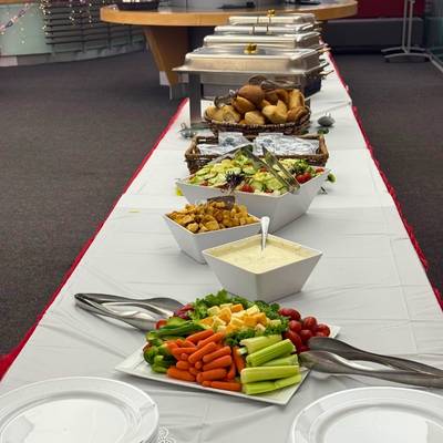 Buffet set up including chafing dishes and china