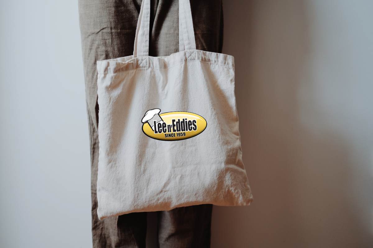 tote bag with a lee n' eddies logo branded on the front