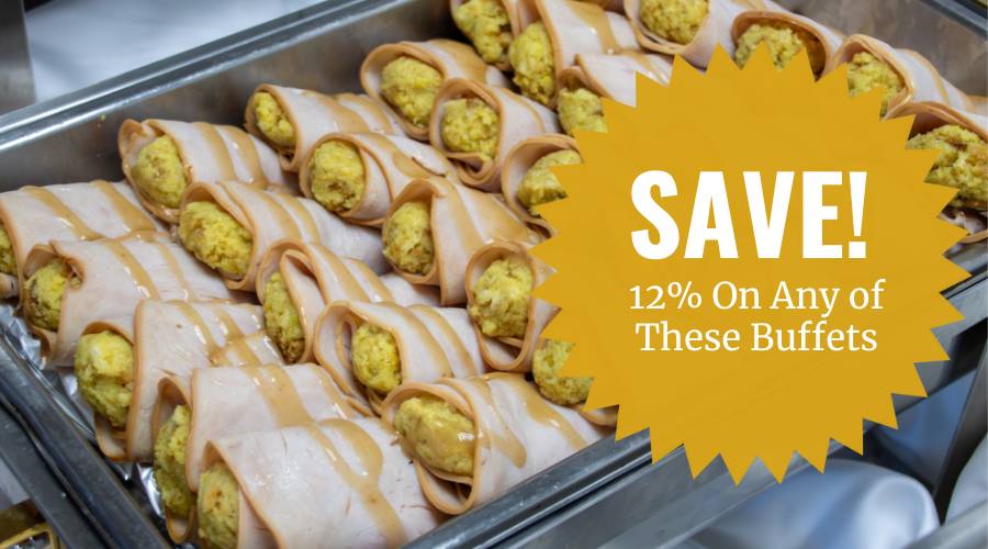 sheet pan full of turkey filled with stuffing and topped with gravy