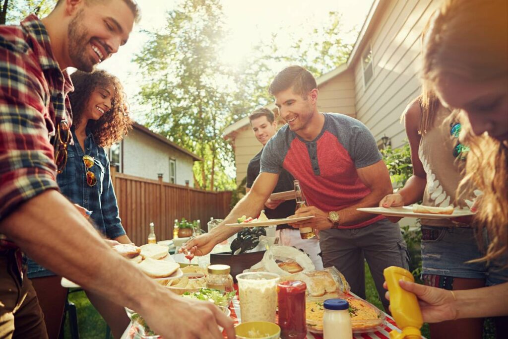 Potluck party in backyard